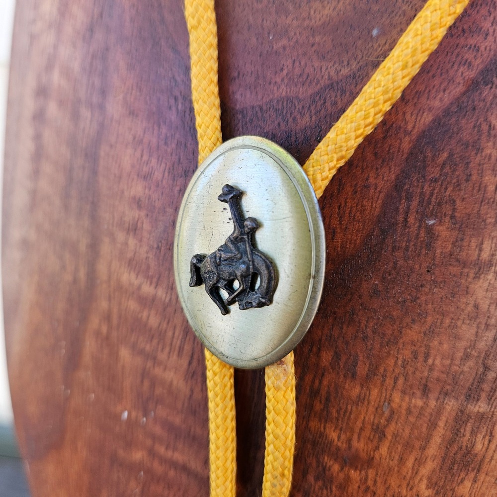 Vintage Bronco Rider Bolo Tie Mustard Yellow Braided Cord Wood Tips Western